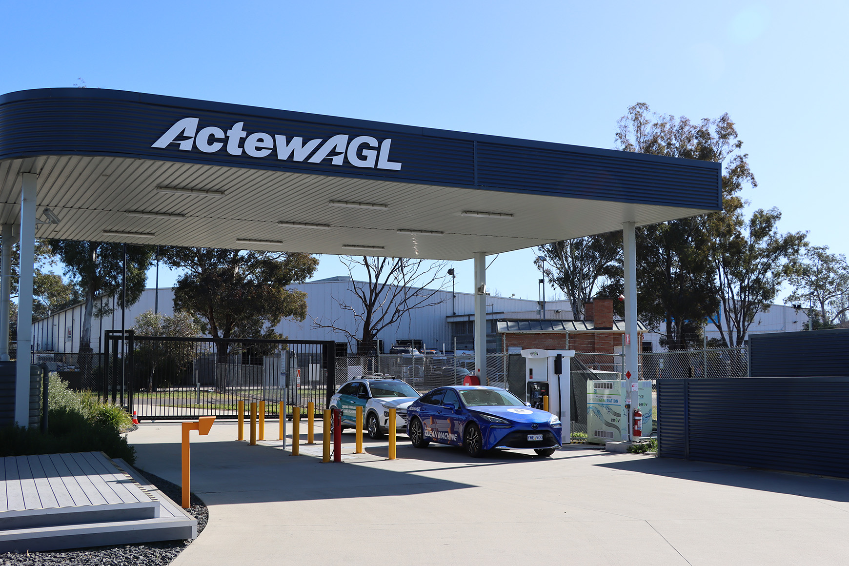The photo shows a Hyundai Nexo and a Toyota Mirai at the Canberra hydrogen refuelling station